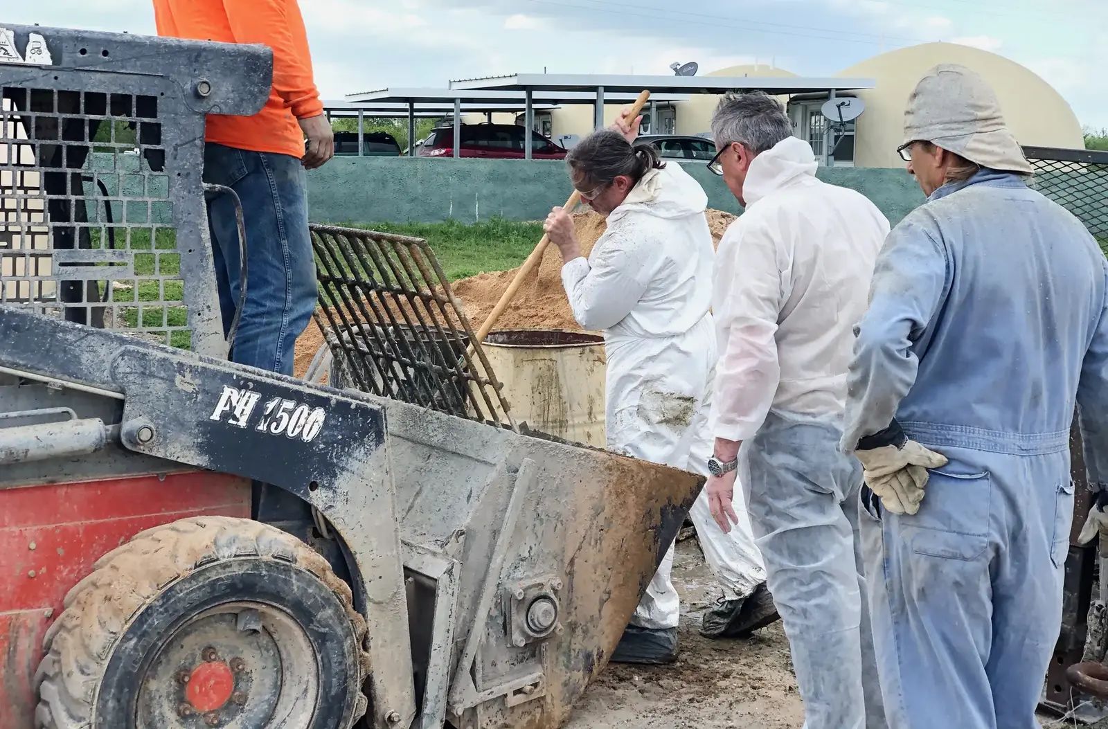 Workshop attendees learn how to mix shotcrete.