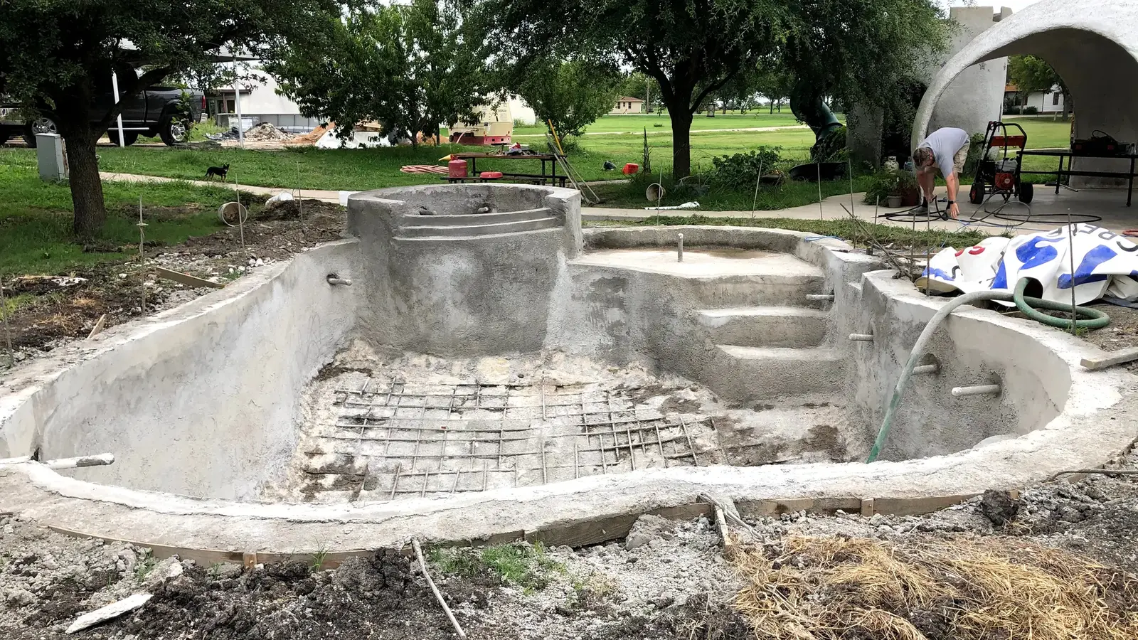 The pool still needing one more layer of shotcrete.